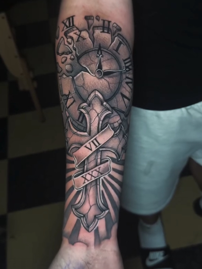 Clock and cross forearm tattoo